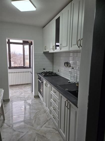 Apartament cu 2 camere decomandat în Podul de Fier