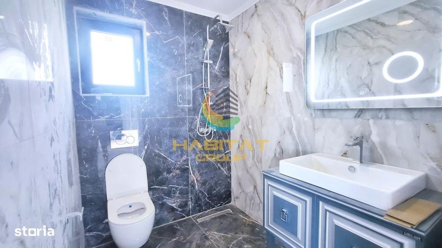 Casă cu 4 camere în Tunari