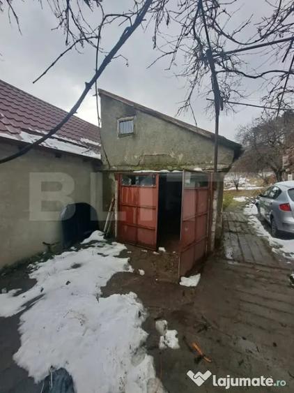 Casă cu 2 camere cu Teren 1400 Mp în Central