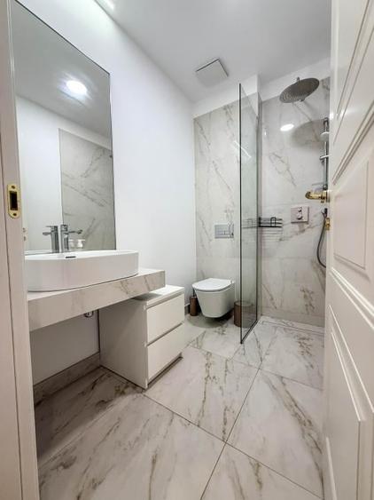 Apartament cu 2 camere semidecomandat, mobilat în Calea Victoriei