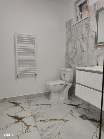 Casă cu 4 camere în Săbăreni
