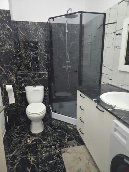 Apartament cu 2 camere semidecomandat, mobilat în UTA