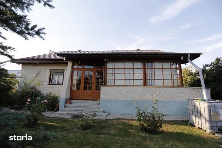 Casă cu 4 camere cu Teren 1400 Mp în Răucești