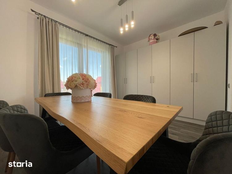 Casa individuala de vanzare cu 4 camere, amplasata pe un teren de 412 - 17