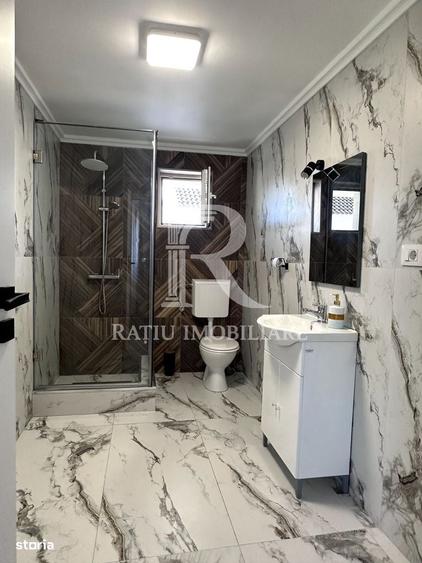 Casă cu 4 camere în Sânmartin