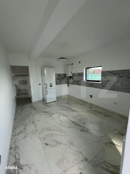 Casă cu 4 camere în Tomești