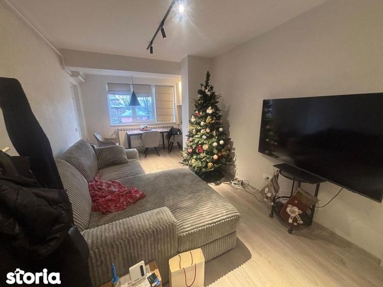 Apartament cu 3 camere semidecomandat, mobilat în Central