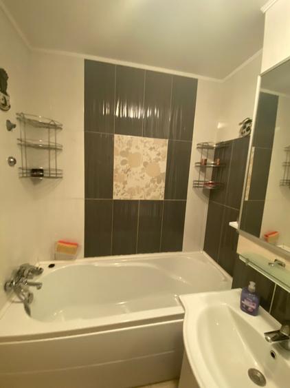 Apartament cu 2 camere semidecomandat, mobilat în Podu Roș