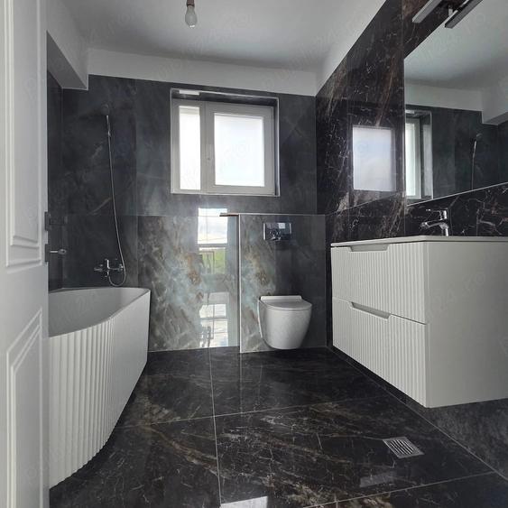 Casă cu 4 camere cu Teren 311 Mp în Tunari