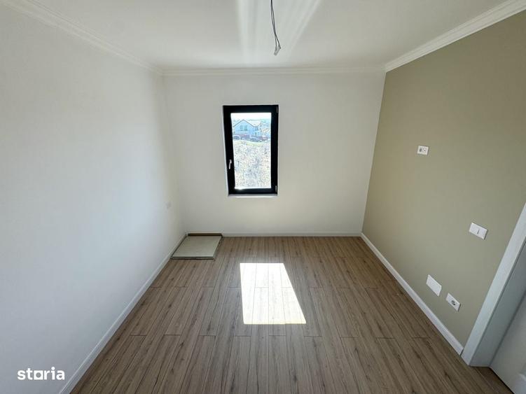 Casă cu 4 camere în Tomești