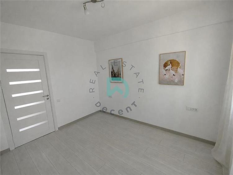 Apartament cu 3 camere decomandat în Tractorul