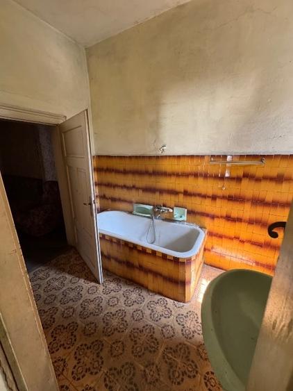 Casă individuală cu 5 camere cu Canalizare în Banu Mărăcine