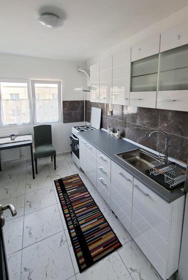 INCHIRIEZ apartament 2 camere - 14