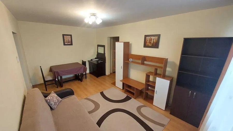 Apartament cu 2 camere semidecomandat, mobilat în Podu Roș