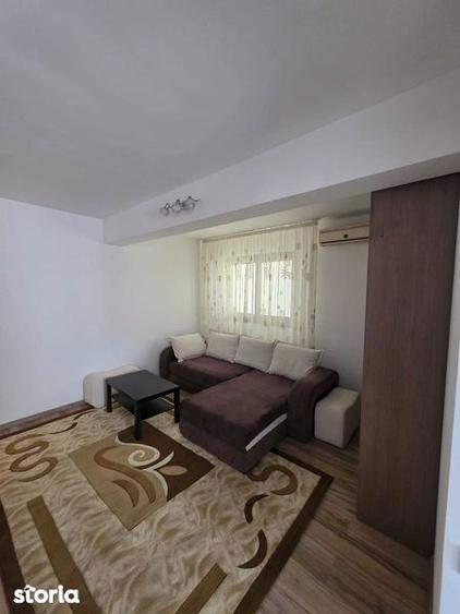 Apartament cu 2 camere semidecomandat, mobilat în Central