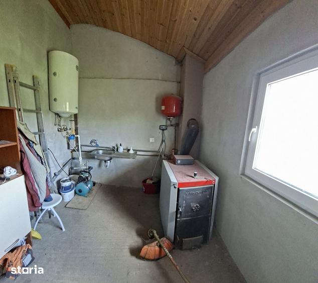 Casă cu 2 camere cu Teren 1350 Mp în Cozma