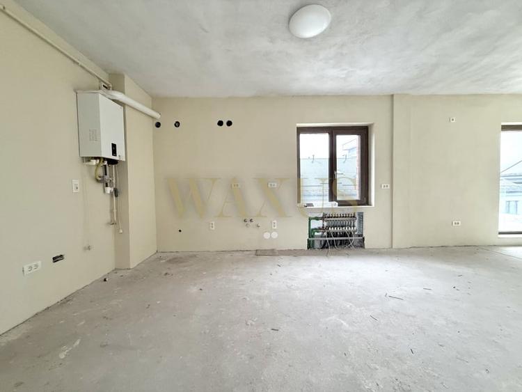 Apartament cu 3 camere semidecomandat în Borhanci