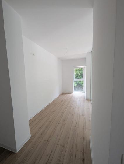 Apartament cu 3 camere decomandat în Petricani