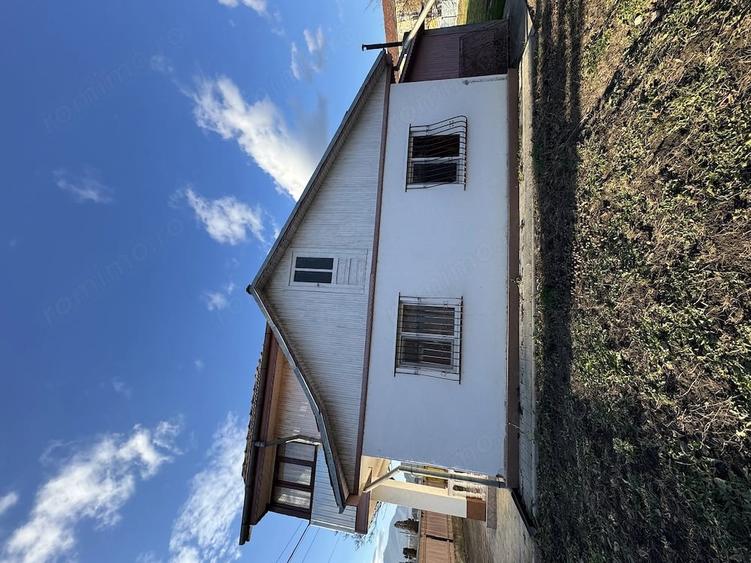 Teren de 2000 mp, în Coman