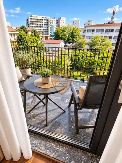 Apartament cu 2 camere semidecomandat, mobilat în Faleza Nord