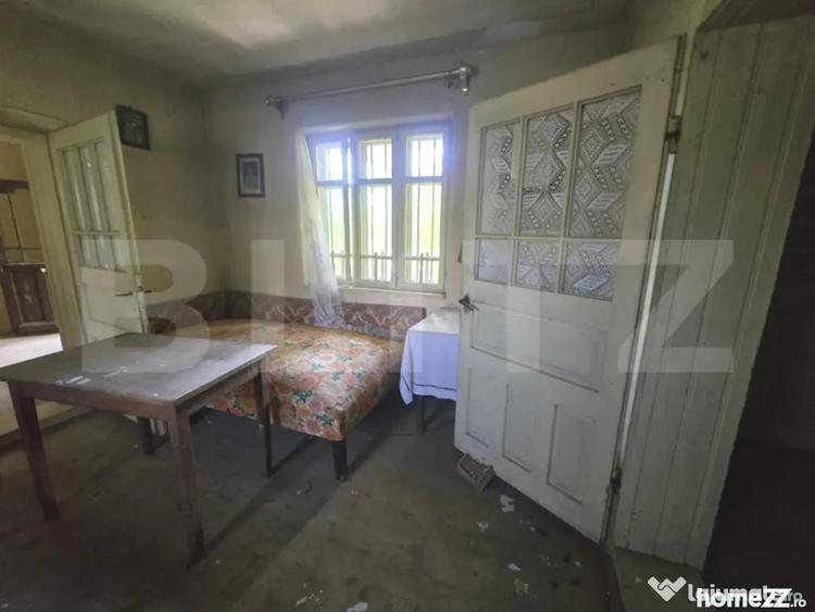 Casă cu 3 camere cu Teren 1954 Mp în Tomșani