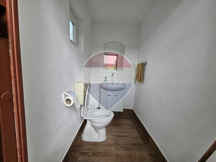 Casă cu Teren 855 Mp în Central