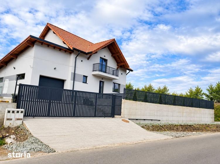 Casă cu 5 camere cu Teren 1000 Mp în Baciu