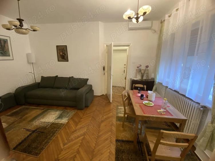 Apartament cu 3 camere nedecomandat, mobilat în Gara de Nord