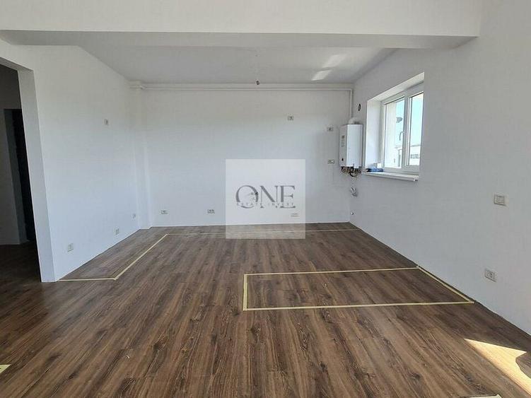 Apartament cu 3 camere decomandat în Tractorul
