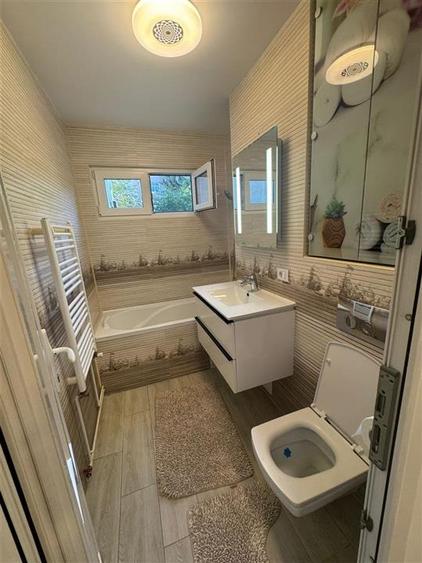Apartament cu 3 camere semidecomandat, mobilat în Central