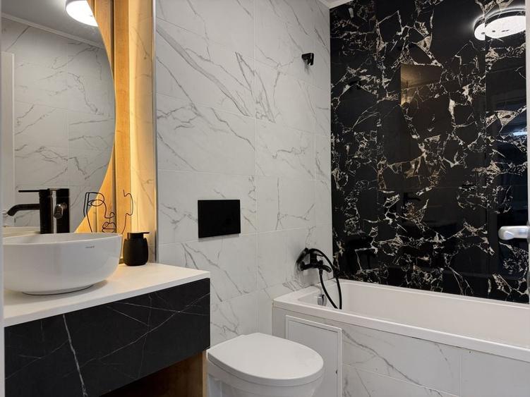 Apartament cu 3 camere decomandat în Tunari
