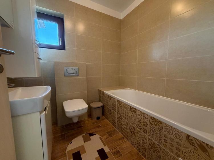 Casă individuală cu 4 camere cu Teren 440 Mp în Tunari