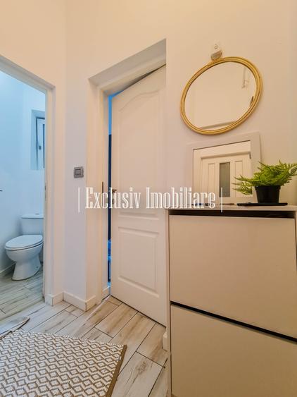 Apartament cu 3 camere semidecomandat, mobilat în Central