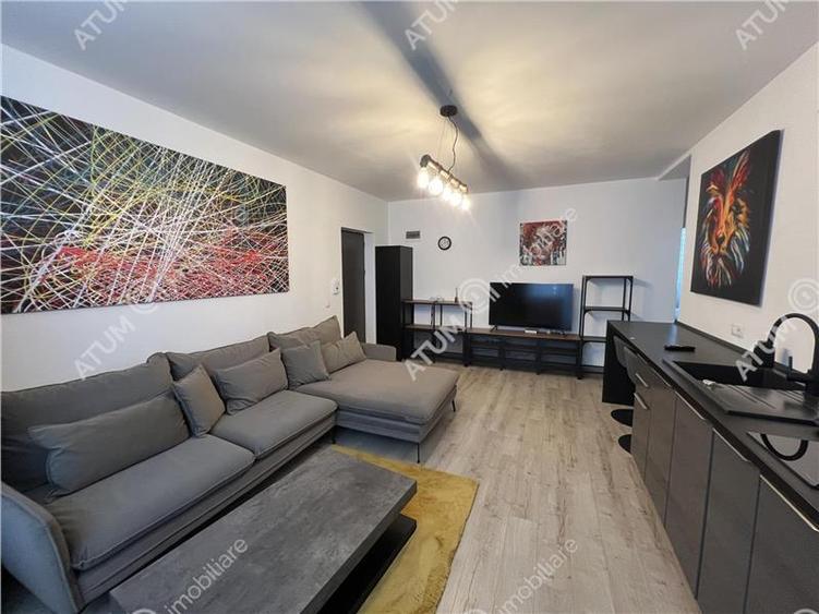 Apartament cu 3 camere decomandat, mobilat în Șelimbăr — fotografia 2