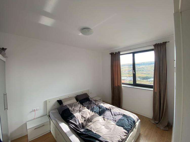 Apartament cu 2 camere semidecomandat în Chinteni