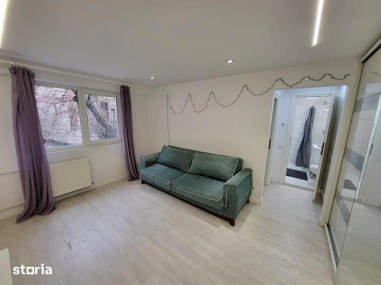 Apartament cu 2 camere semidecomandat, mobilat în P-ța Victoriei