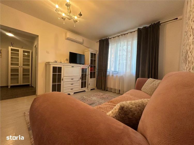 Apartament cu 2 camere semidecomandat, mobilat în Podu Roș