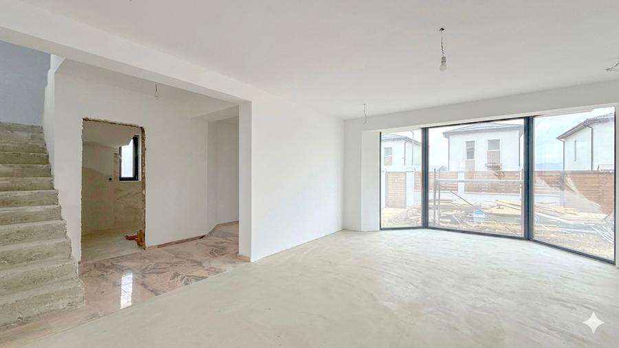 Casă individuală cu 4 camere cu Teren 900 Mp în Tărlungeni