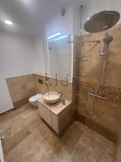 Apartament cu 2 camere semidecomandat, mobilat în Central