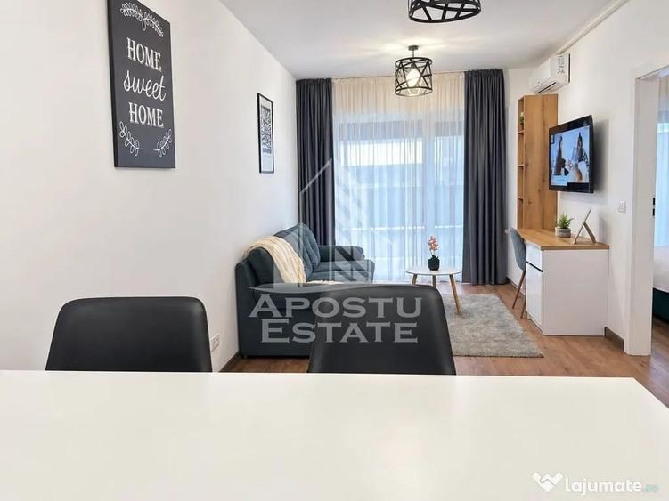 Apartament cu 2 camere semidecomandat, mobilat în Central