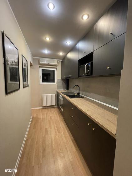 Apartament cu 3 camere decomandat în Romană