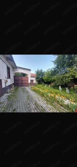 Casă cu Teren 1280 Mp în Central