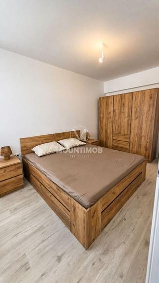 Apartament cu 2 camere semidecomandat, mobilat în Tractorul