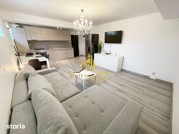 Apartament cu 2 camere semidecomandat, mobilat în Borhanci