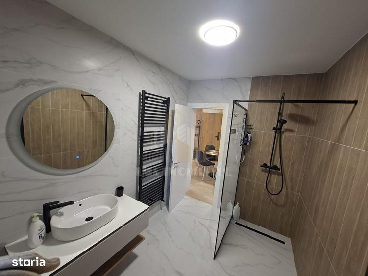 Apartament cu 2 camere decomandat în Poiana Brașov