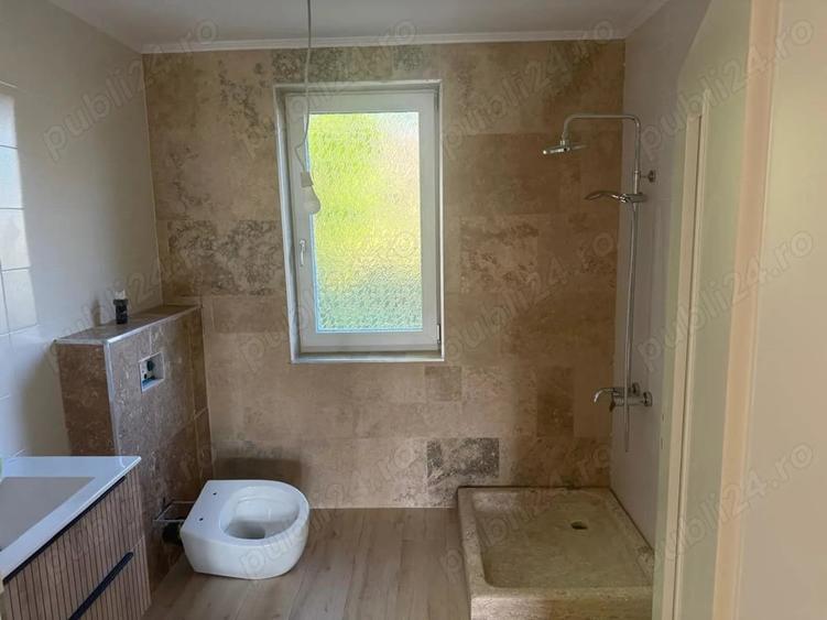 Casă cu 6 camere cu Teren 920 Mp în Slimnic