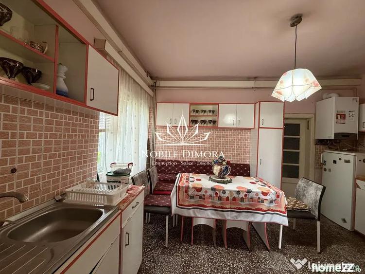 Casă cu 4 camere cu Teren 398 Mp în Central