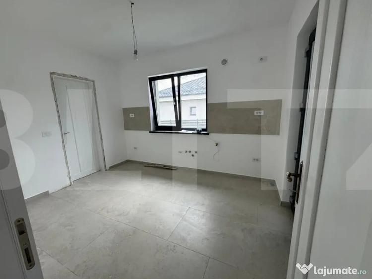 Casă cu 4 camere cu Teren 1250 Mp în Curtești