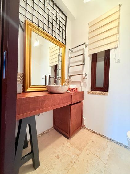 Apartament cu 4 camere decomandat în Magheru