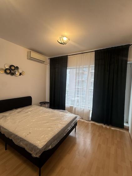 Garsonieră decomandată în Titan